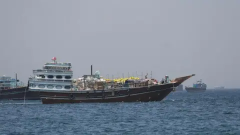 Reuters A number of commercial ships seen in the Strait of Hormuz