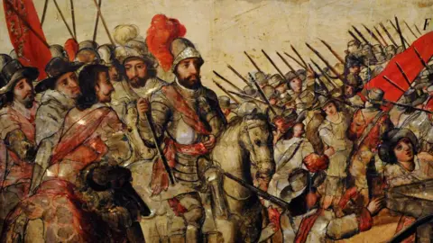 PHAS/Universal Images Group via Getty Images A painting from 1676-1700 shows men with beards on horseback and an army
