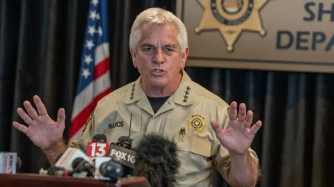 Getty Images Pima County Sheriff Chris Nanos gives a news conference update on the disappearance of Nancy Guthrie