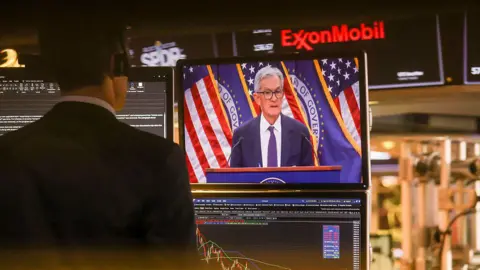 Bloomberg via Getty Images A livestream shows Jerome Powell, chairman of the US Federal Reserve, speaking after a Federal Open Market Committee (FOMC) meeting on the floor of the New York Stock Exchange (NYSE) in New York, US, on Wednesday, Jan. 28, 2026.
