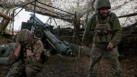 Reuters Artillerymen of the 152nd Separate Jaeger Brigade fire an M114 self-propelled howitzer towards Russian troops near Pokrovsk