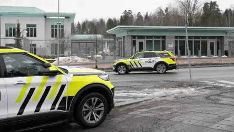 Reuters Police vehicles park outside the U.S. Embassy, after a loud bang was reported at the site, in Oslo, Norway, March 8