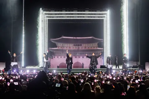 BIGHIT MUSIC AND NETFLIX Concert with palace in the background
