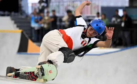 Fred Lee/Getty Images Aya Asaqas of Morocco competes during the Women's Park Prelims Heat 1 on day one of the Olympic Qualifier Series in Shanghai, China - Thursday 16 May 2024