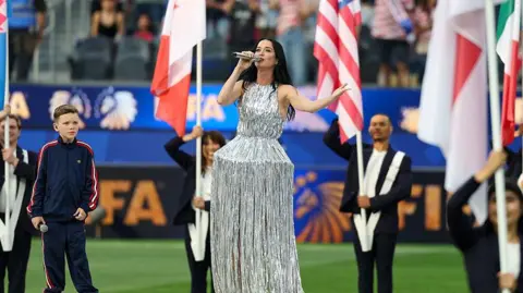 Getty Images Katy Perry and 10-year-old Norwegian singer Tius Luka perform Wonder live during the Opening Ceremony before the FIFA World Cup 2026 Group D match between USA and Paraguay at Los Angeles Stadium on June 12, 2026 in Los Angeles, California. 