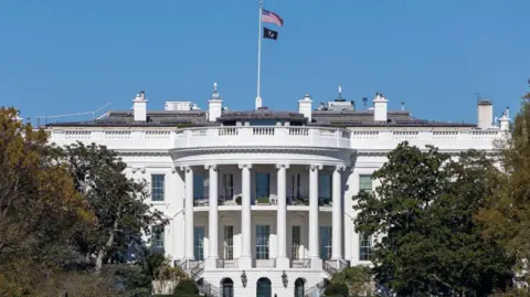 Getty Images White House pictured under a clear blue sky