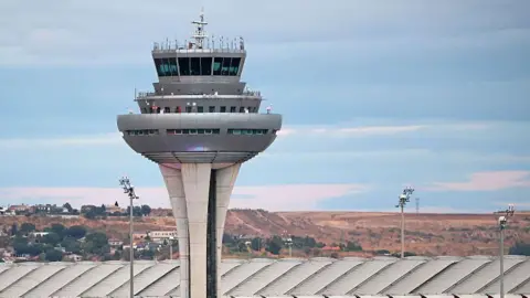 Joan Valls/Urbanandsport/NurPhoto via Getty Images The control tower at Adolfo Suarez Airport in Madrid, Spain, on October 11, 2025.