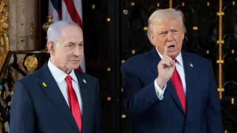 Reuters U.S. President Donald Trump speaks to the media next to Israeli Prime Minister Benjamin Netanyahu.