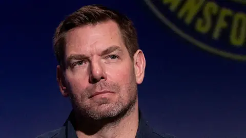 AFP via Getty Images Democratic United States Representative Eric Swalwell attends the SEIU-United Service Workers West (SEIU-USWW) Gubernatorial Candidate Worker Forum at Meruelo Studios in Los Angeles, California, on January 10, 2026.