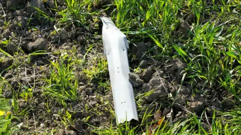 Reuters A fragment of the downed drone on the ground in Estonia. Photo: 19 May 2026