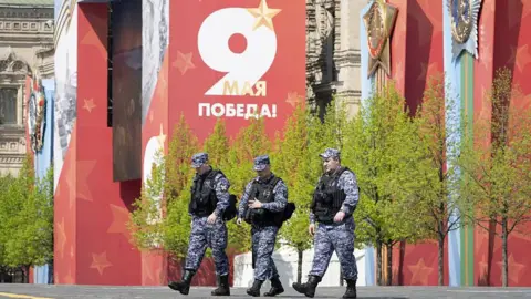 Natalia Kolesnikova/Anadolu via Getty Images A Victory Day sign is seen in the middle of Red Square in Moscow