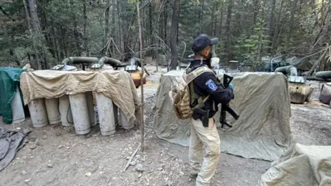 Reuters A suspected clandestine methamphetamine processing lab, according to the Attorney General's Office of Chihuahua, discovered during an operation by Mexican authorities in a mountainous area near Guachochi, in Chihuahua state, Mexico, in this handout photo distributed on April 18, 2026.
