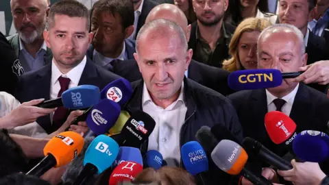 Reuters Rumen Radev, former Bulgarian president and leader of Progressive Bulgaria coalition, speaks to the media after the first exit polls at the parliamentary election.