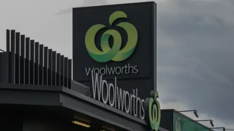 Getty Images Woolworths signage outside one of its supermarkets in Melbourne, Australia.