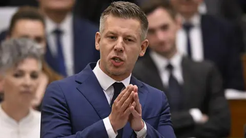 NurPhoto via Getty Images Hungary's prime minister Péter Magyar speaking in parliament in Budapest