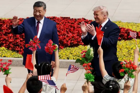 Getty Images U.S. President Donald Trump and Chinese President Xi Jinping attend a welcome ceremony at the Great Hall of the People on May 14, 2026 in Beijing, China.