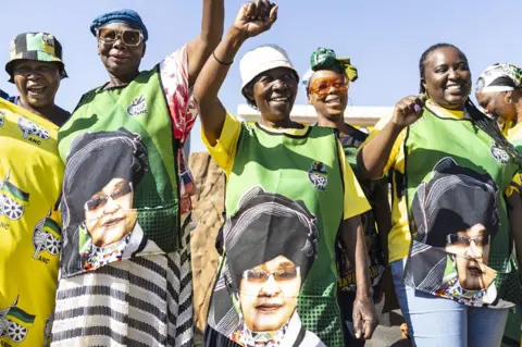 Kim Ludbrook/EPA ANC supporters waving in Pretoria, South Africa -Friday 10 May 2024