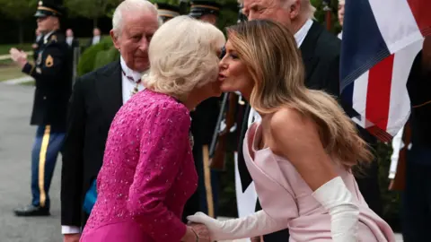 Reuters First lady Melania Trump welcomes Queen Camilla at the South Portico as they arrive for a state dinner at the White House in Washington, D.C., U.S., April 28, 2026. REUTERS/Evelyn Hockstein
