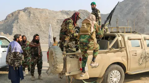 Reuters Taliban soldiers carry a rocket launcher in a vehicle, following exchanges of fire between Pakistan and Afghanistan forces, near Torkham border in Afghanistan