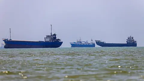 AFP via Getty Images In this picture obtained from Iran's ISNA news agency, vessels are seen anchored in Bandar Abbas along the Strait of Hormuz.
