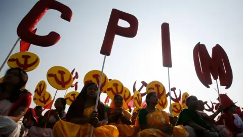 REUTERS Supporters of the Communist Party of India (Marxist) (CPI-M) attend a public rally addressed by chief Prakash Karat, ahead of their four-day-long state conference in Agartala, capital of India's northeastern state of Tripura, January 29, 2012. 