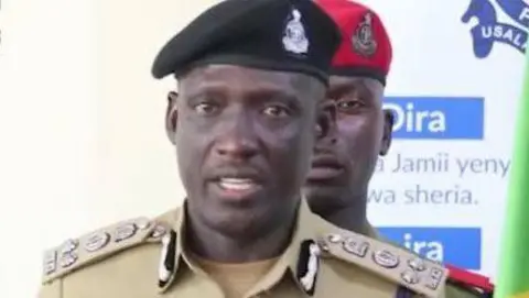 Tanzania Police A close-up of Faustine Jackson Mafwele in full police uniform 