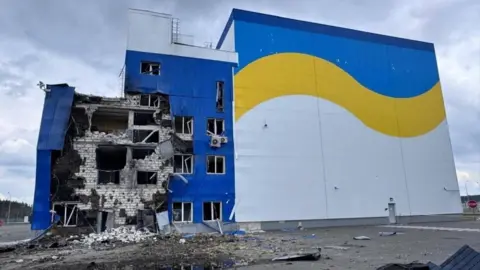 Reuters A handout image from Ukraine's Energoatom shows damage to a spent nuclear fuel storage facility