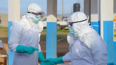 EPA Medical staff wearing protective equipment at a hospital in Bunia, Ituri Provice in the Democractic Republic of Congo