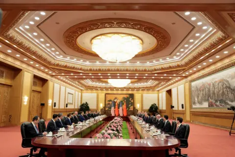 Reuters U.S. President Donald Trump participates in an expanded bilateral meeting with Chinese President Xi Jinping at the Great Hall of the People in Beijing, China, May 14, 2026. 