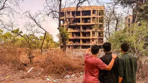 Zoya Mateen From L to R: Adtiya stands with his friend Arjun and Arman at the crash site 
