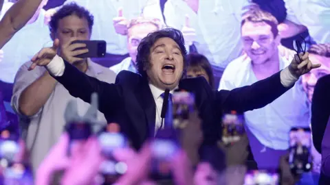 EPA/Shutterstock Argentine President Javier Milei celebrates after learning the results of the legislative elections in Buenos Aires, Argentina, 26 October 2025. 