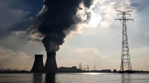 AFP via Getty Images A photograph taken on November 21, 2025 shows the nuclear plant of Doel, in Antwerp