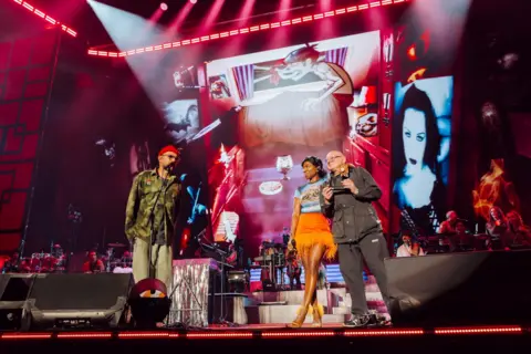 Phoebe Fox Shaun Ryder and Roses Gabor on stage with Damon Albarn