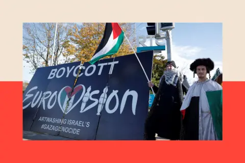 Reuters Pro-Palestinian protestors hold a flag and a banner outside the RTÉ (Radio Telefis Eireann) Irish public service broadcaster television studios