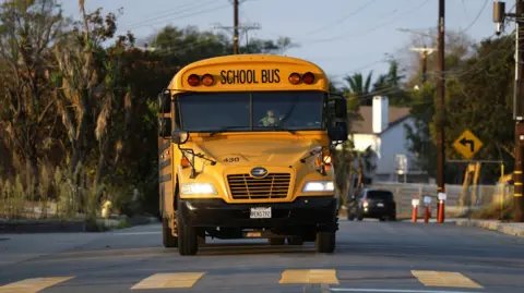 Getty Images A school bus in California approaches a crossing 