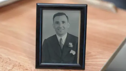 BBC A picture of a man in a frame