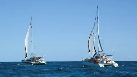 Reuters The sailboats Friendship and Tigger Moth, carrying humanitarian aid for Cuba and crewed by activists taking part in the Nuestra America Convoy flotilla, depart Isla Mujeres, in Isla Mujeres, Quintana Roo state, Mexico.