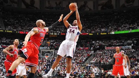 Getty Images Jason Collins #34 of the Atlanta Hawks shoots against Carlos Boozer #5 of the Chicago Bulls during Game Six of the Eastern Conference Semifinals in the 2011 NBA Playoffs on May 12, 2011 