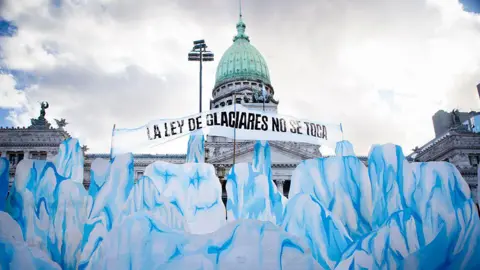 Getty Images Large cardboard cut-outs of glaciers in front of Argentina's national congress