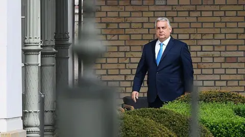 Ferenc ISZA/AFP via Getty Images Outgoing Hungarian Prime Minister Viktor Orban arrives at the Presidential Sandor Palace in Budapest on April 15, 2026 to meet with Hungary's President, three days after general elections in Hungary
