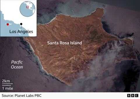 A satellite image showing smoke rising from a fire south of Simi Valley