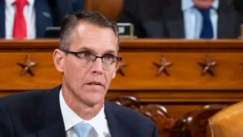 Getty Images File image of Randy Feenstra. He wears a suit as he attends a hearing in the US House