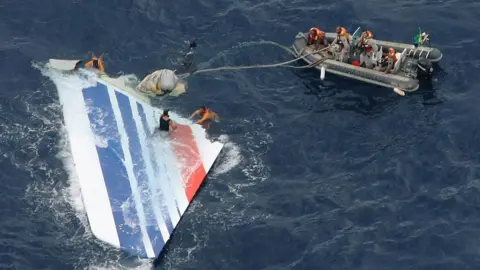 Getty Images Plane wreckage floating in the sea