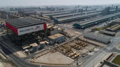 Aluminium Bahrain Aluminium Bahrain operates one of the largest smelters in the world. Image shows a number of industrial buildings 
