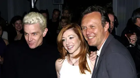 Albert L. Ortega/WireImage Anthony Head with Buffy stars James Marsters and Alyson Hannigan pose for a photo together, with Alyson in the middle