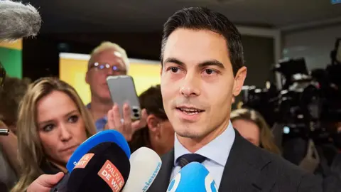Pierre Crom/Getty Images D66 leader Rob Jetten addresses the press in a meeting room ahead of the faction meeting on October 30, 2025 in The Hague, Netherlands. 