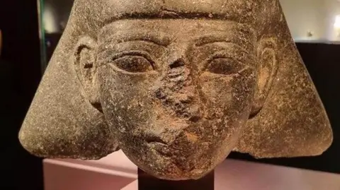 Netherlands Information & Heritage Inspectorate A stone sculpture of a high-ranking official from the dynasty of Pharaoh Thutmose III