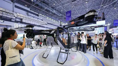 Getty Images 'Land Aircraft Carrier' flying car developed by Xpeng Aeroht on display