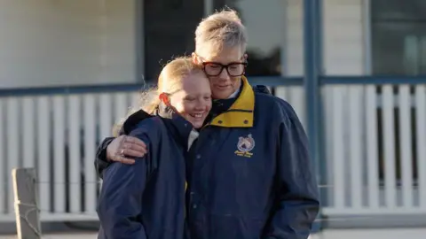 Nathan Morris/Australian Broadcasting Corporation Chrissy Walters and her daughter Mia hug