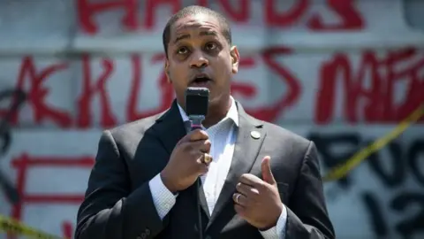 Getty Images Justin Fairfax speaks at a gathering in 2020